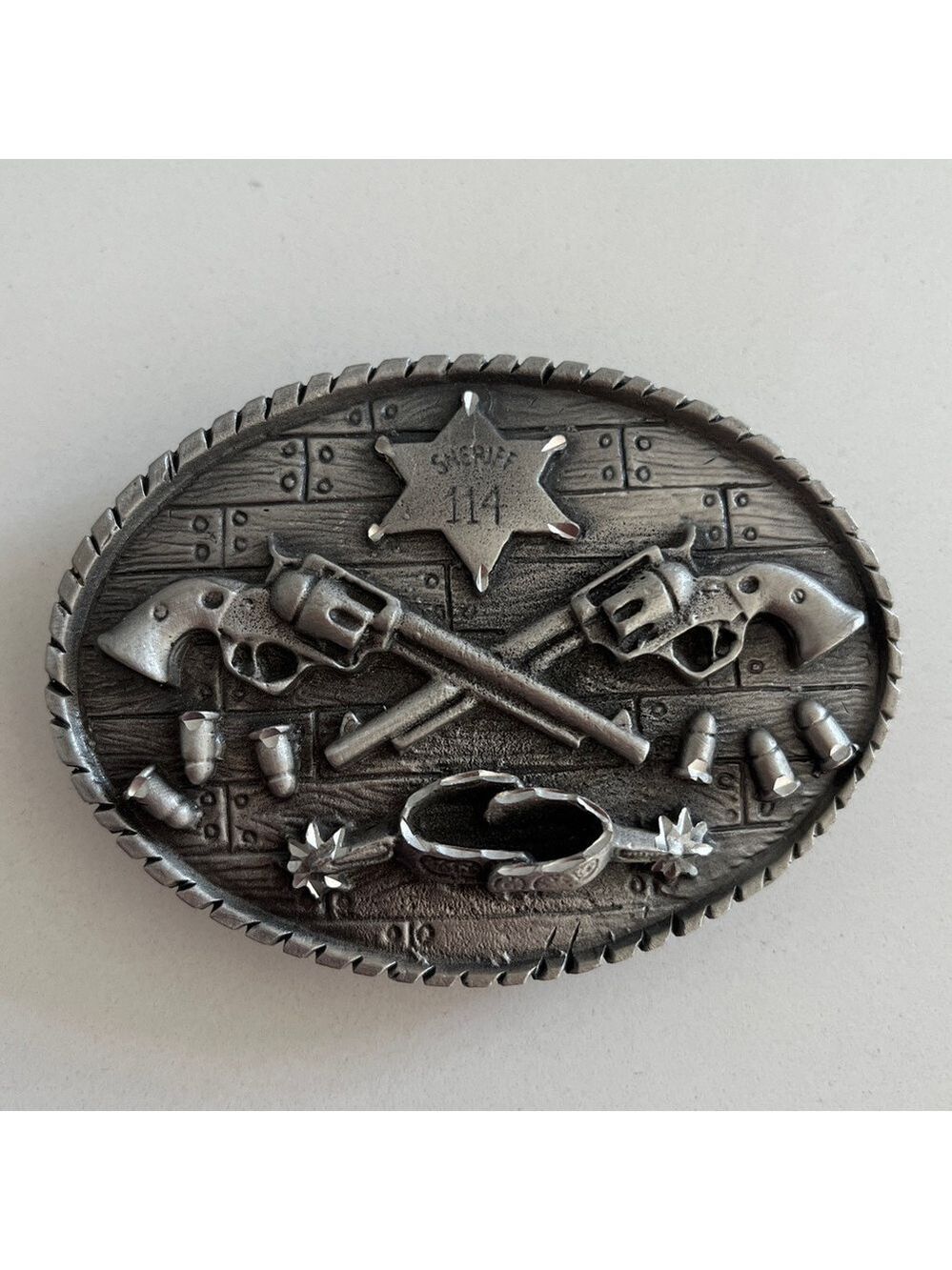 EMI 2006 Oval Pewter Tone Metal Western Theme Belt Buckle Sheriff Badge Spurs